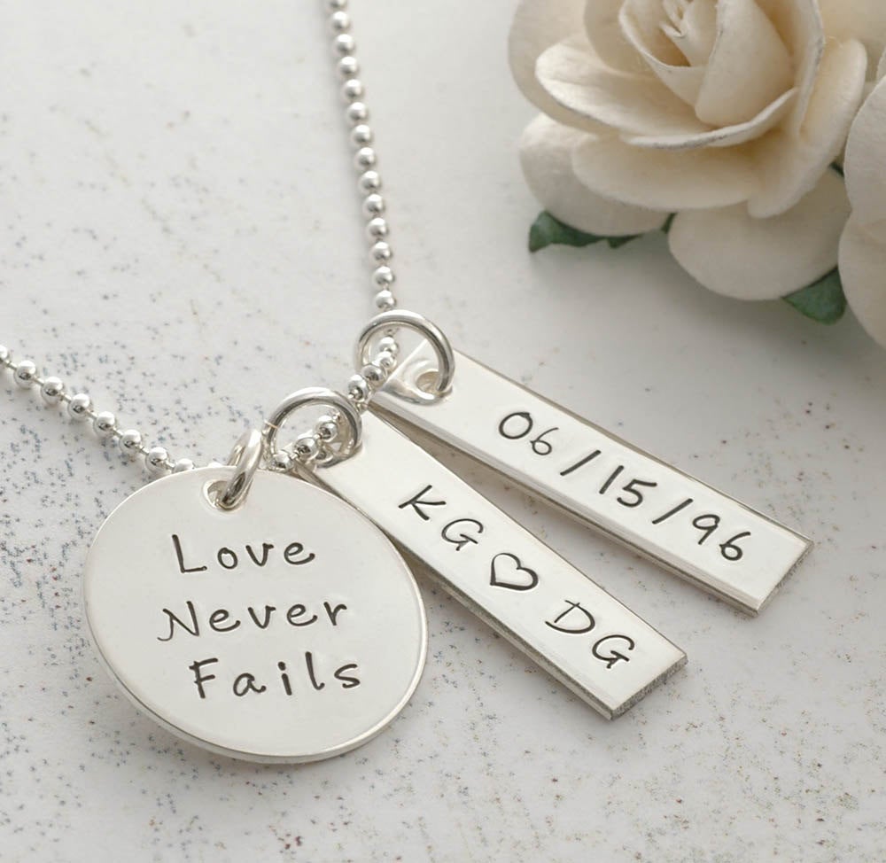 Love Never Fails - Personalized hand stamped necklace