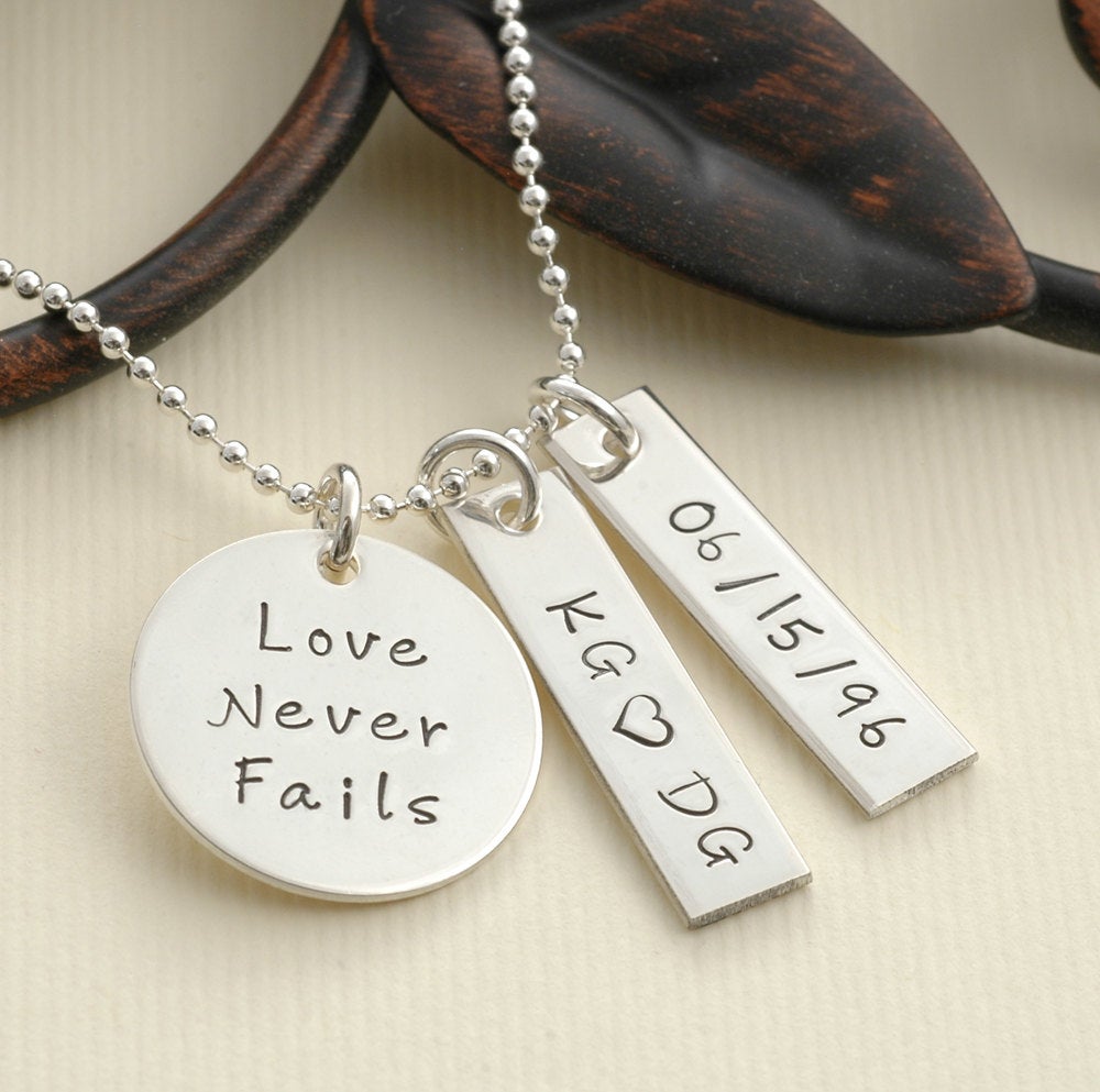 Love Never Fails - Personalized hand stamped necklace